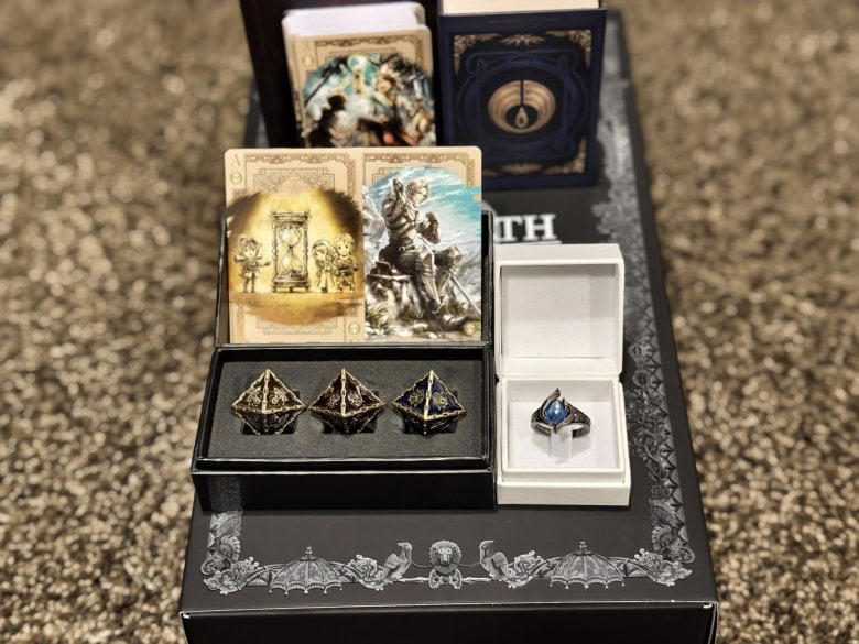 ​1. แผ่นเกมและ Digital Content: จุดเริ่มต้นของตำนาน, ​2. Music Arrangement Break &amp; Boost Vol.3: สุนทรียศาสตร์ที่จับต้องได้, ​3. Orsterra Map Mousepad: แผนที่แห่งยุทธศาสตร์, ​4. The Craftsmanship Playing Cards: ไพ่ที่ซ่อนจิตวิญญาณ, 5. Art Booklet: คลังภาพร่างแห่งโชคชะตา, ​6. 8-Sided Dice: ลูกเต๋าแห่งไตรภาคี, ​7. Ring of the Flamebringer: พันธสัญญาแห่งผู้นำเพลิง